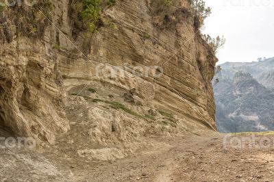 Dirt road by the hill
