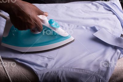 Ironing a shirt