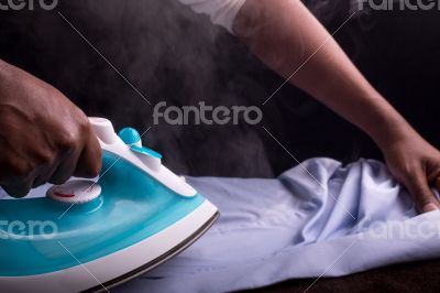 Ironing a shirt