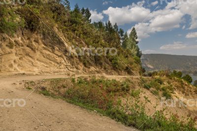 Dirt road going around the hills