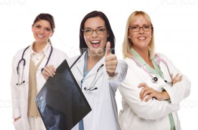 Three Female Doctors or Nurses with Thumbs Up Holding X-ray