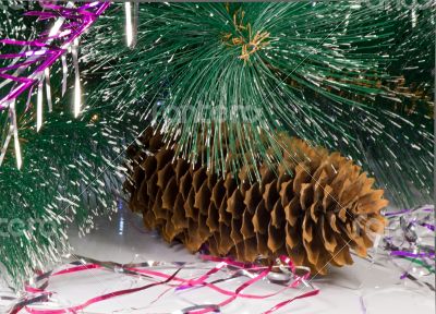 Decoration for the Christmas tree is a pine cone.