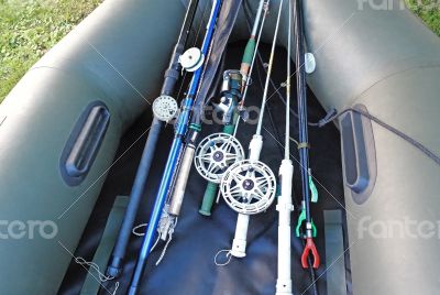 Prepared for fishing, spinning, fishing rods, rubber boat.