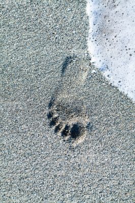Caribbean cuba beach with footprints in the sand