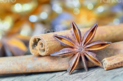 extremely closeup view of anise star and cinnamon sticks