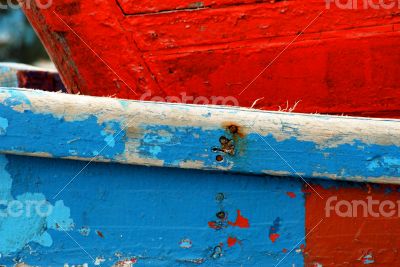 Peeling paint on rusted metal surface
