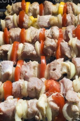 Raw shashlik on a skewer