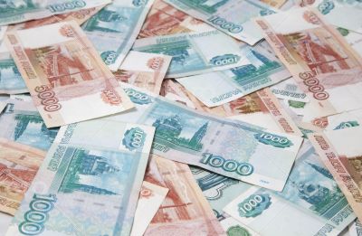 Background of one and five thousand russian roubles bills