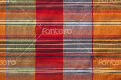 Multicoloured fabric with geometric pattern