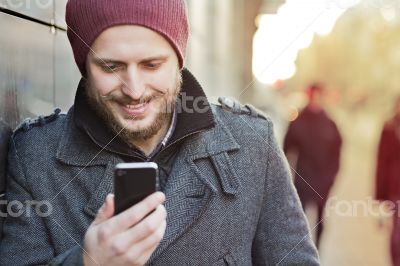 Young man with smartphone