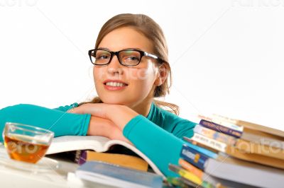 Portrait of female student studying at the table Portrait of female student studying at the table