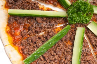 Turkish beef pizza with cucumber on top