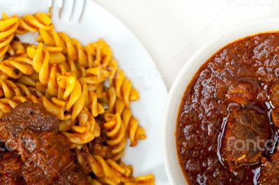 fusilli pasta with neapolitan style ragu meat sauce