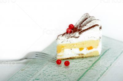 whipped cream and ribes dessert cake slice