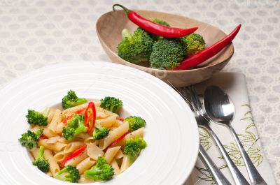 Italian penne pasta with broccoli and chili pepper