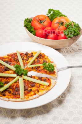 Turkish beef pizza with cucumber on top