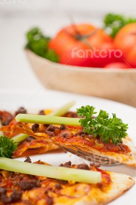 Turkish beef pizza with cucumber on top