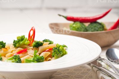 Italian penne pasta with broccoli and chili pepper