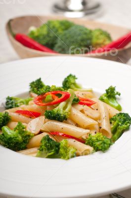 Italian penne pasta with broccoli and chili pepper
