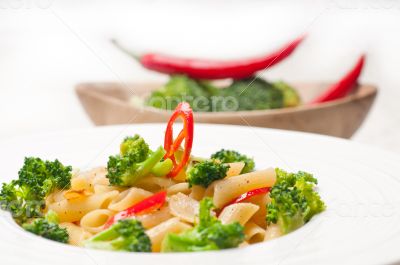 Italian penne pasta with broccoli and chili pepper