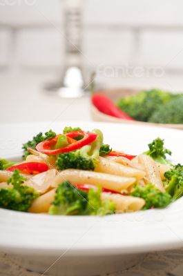 Italian penne pasta with broccoli and chili pepper