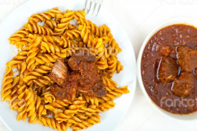 fusilli pasta with neapolitan style ragu meat sauce