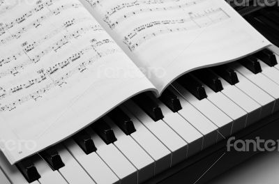 Piano keys and musical book