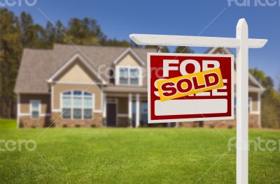 Sold Home For Sale Sign in Front of New House