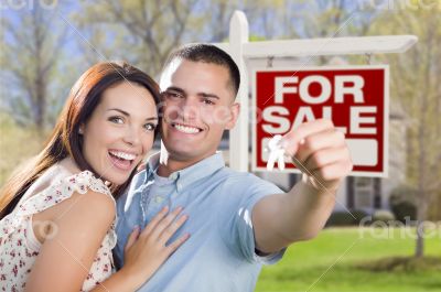 Military Couple In Front of Home, House Keys and Sign