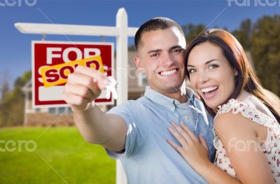 Military Couple In Front of Home, House Keys and Sign