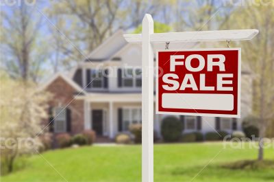 Home For Sale Sign in Front of New House Home For Sale Sign in Front of New House
