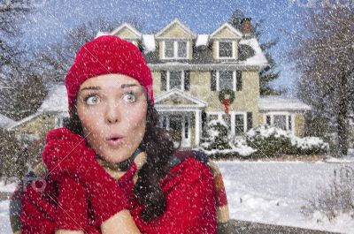 Smiling Mixed Race Woman in Winter Clothing Outside in Snow