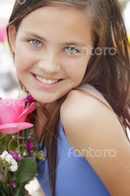 Pretty Young Girl Holding Flower Bouquet at the Market