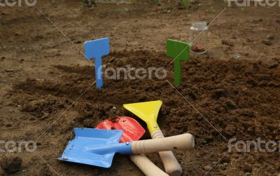 Child`s gardening instruments set-spade, showel, fork.