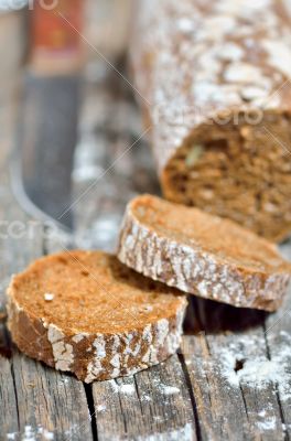 Brown bread on an old wooden table