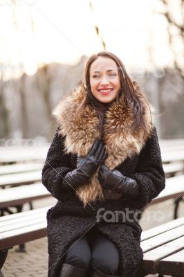 Business woman laughing in the park