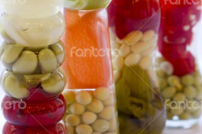 Decorative bottle with canned vegetables. Decorative bottle with canned vegetables.