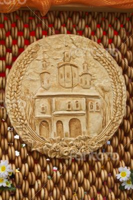 Bread, decorated with the image of the temple, is situated on th