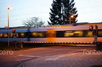 Railroad crossing at night