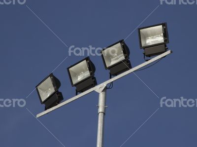 Street lanterns against the background of blue sky