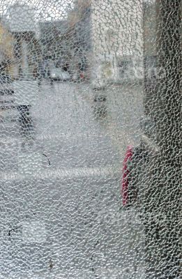 Broken public phone window Broken public phone window