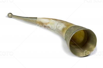 Cup for wine, made from animal horns, on a white background.