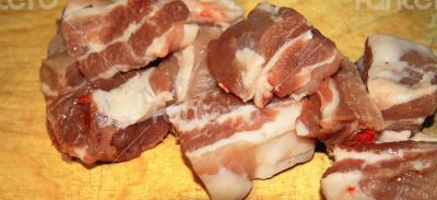 Fresh pork cutting on the wooden desk