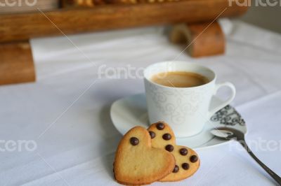 biscuits and a cup of coffee biscuits and a cup of coffee