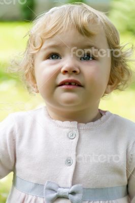 Cute baby looking upwards