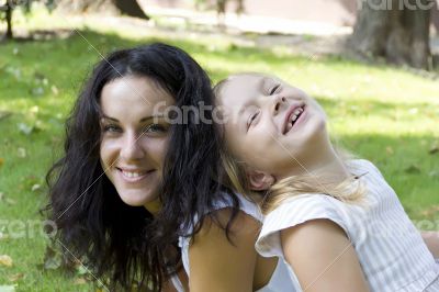 Laugh of mother and daughter