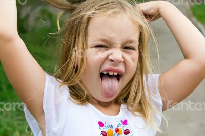 Girl makes faces imitate witch