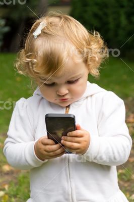 Cute infant with cellular Cute infant with cellular