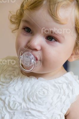 Cute infant with tear