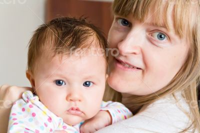 Cute newborn infant and mother